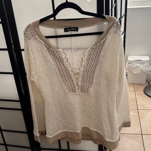 Elegant Cream V-Neck Sweater with Lace-Up Detail